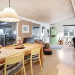 Holiday home Lovely In